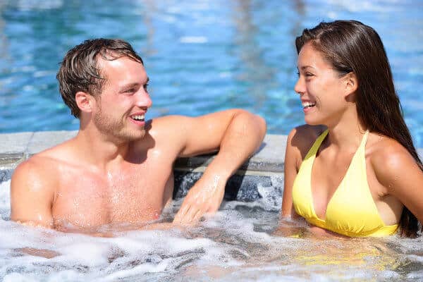 Couple Sitting in Hot Tub