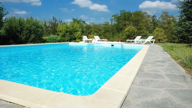 Inground pool on a sunny day