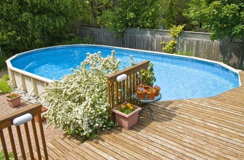 Above ground pool with nice deck