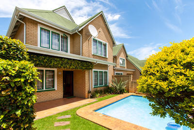 Two story home with backyard swimming pool