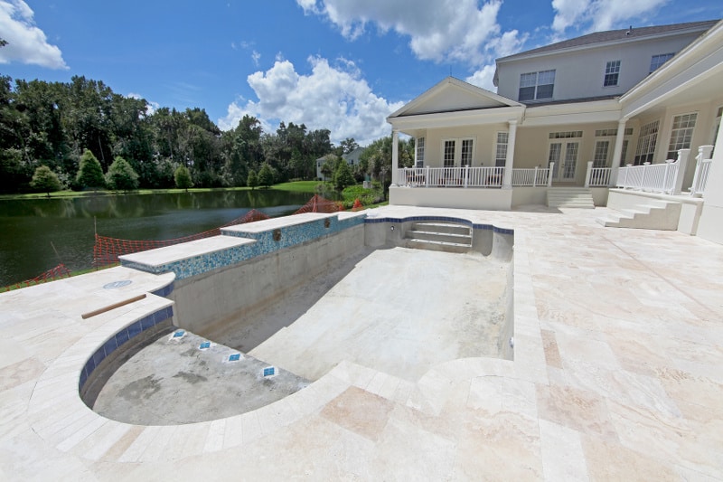 Pool with travertine pavers