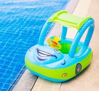 Pool float for kids in the shape of a cartoon car