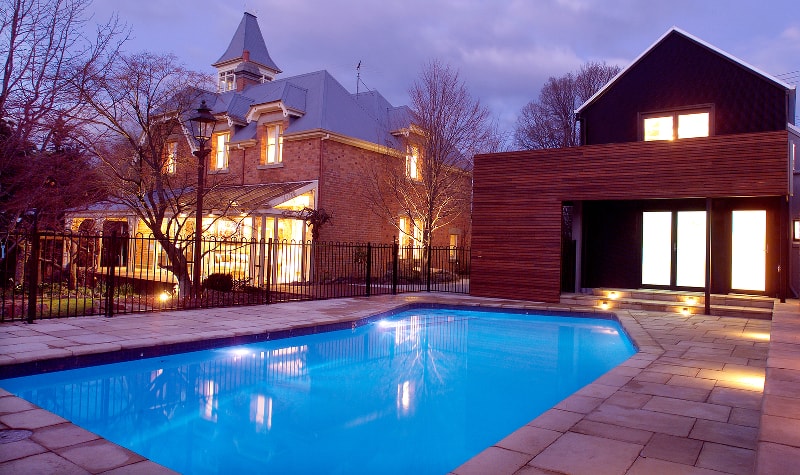 Backyard pool at night