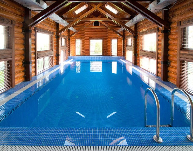 Indoor swimming pool in a cabin structure