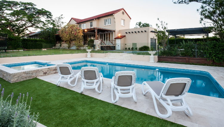 View of a small inground swimming pool, illustrating point about inground pool size