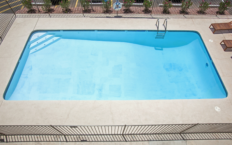 Photo illustrating pool depth slope with overhead side view of inground pool